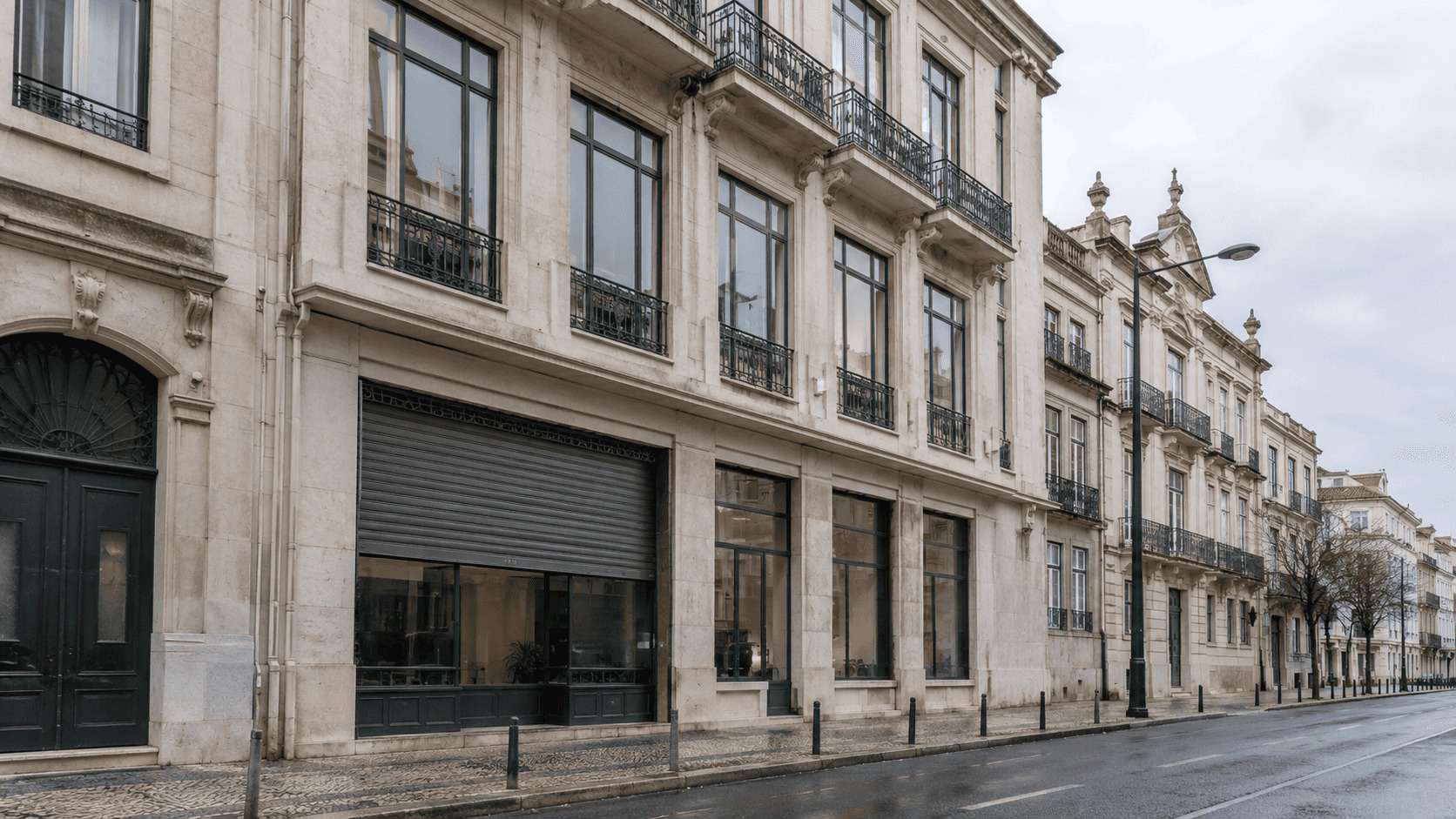 Renovated stone office building on a Lisbon avenue in morning light